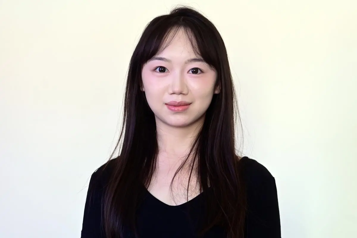 Ms. Zhang Xinyao
